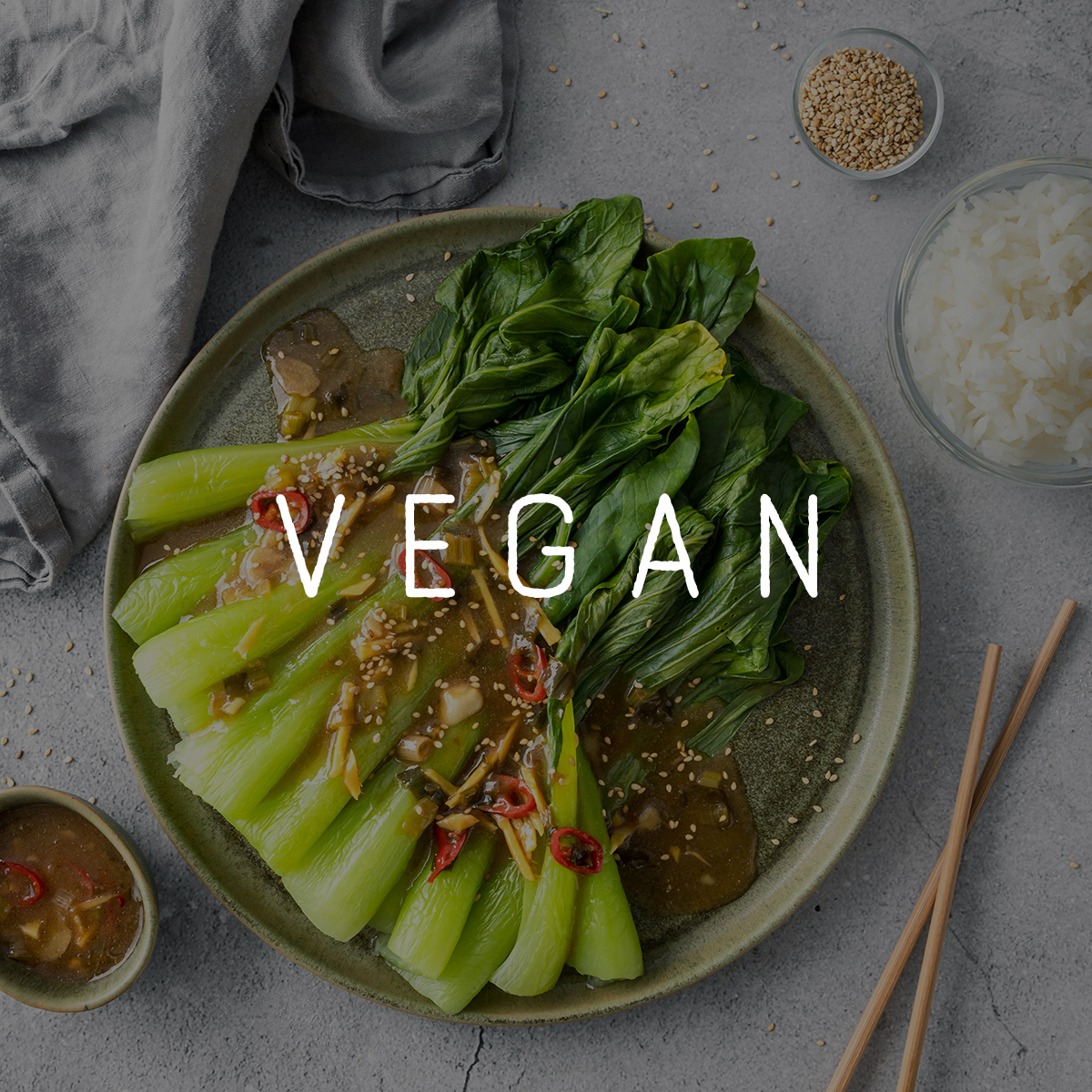 Bild mit köstlich angerichteten Gemüse und der Headline "Vegan"